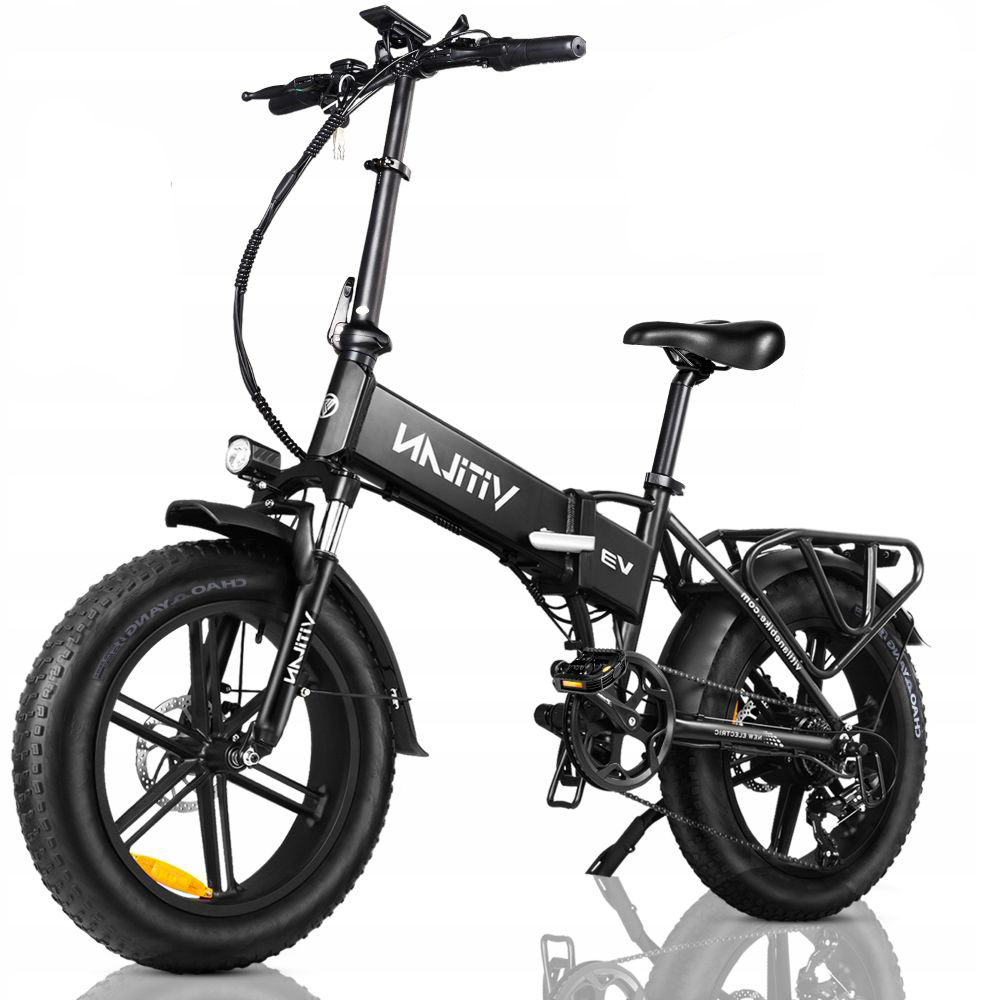 Una bicicletta elettrica pieghevole nera con pneumatici larghi e portapacchi.