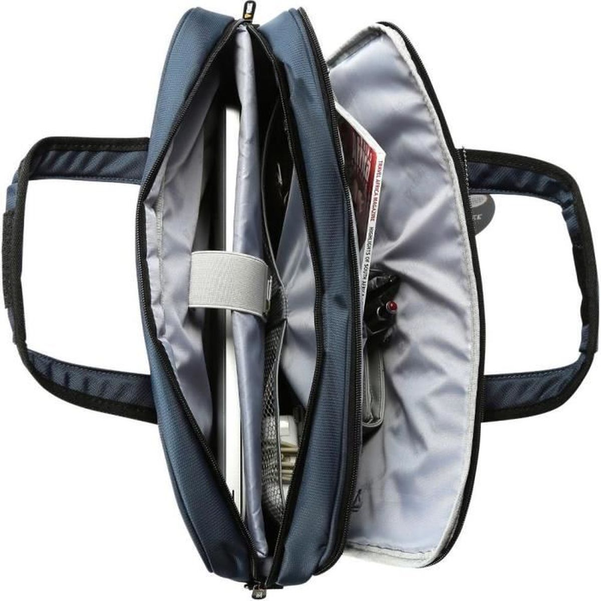 Borsa blu aperta con laptop, rivista e penna all'interno.