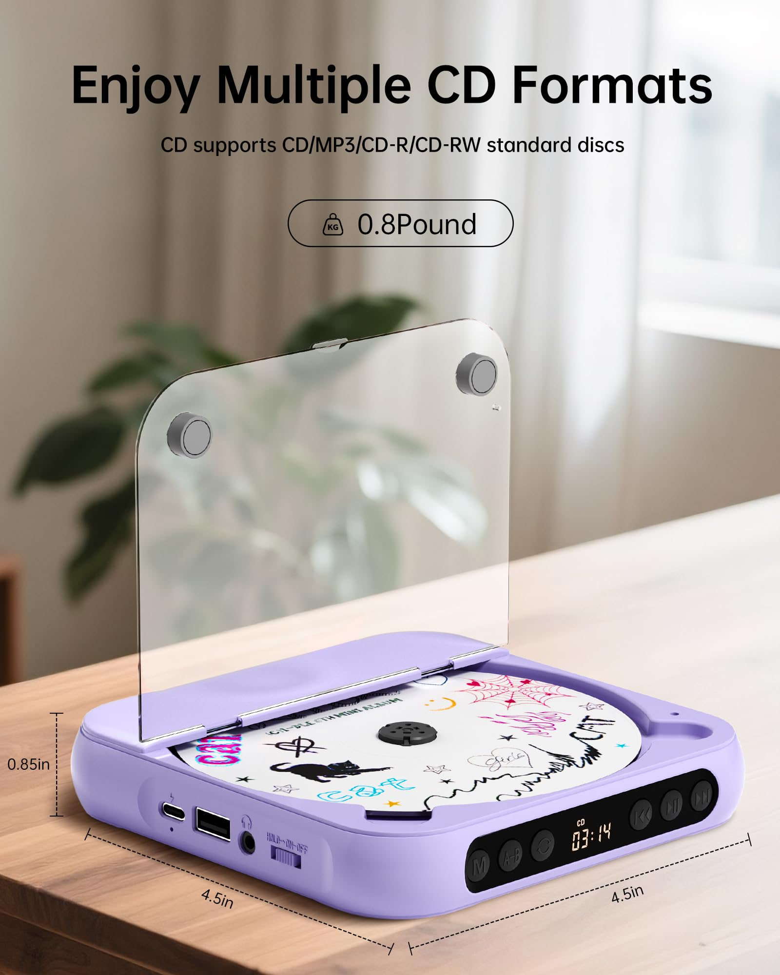 Ein lila tragbarer CD-Player mit einer CD mit Aufklebern, der 0,8 Pfund wiegt.