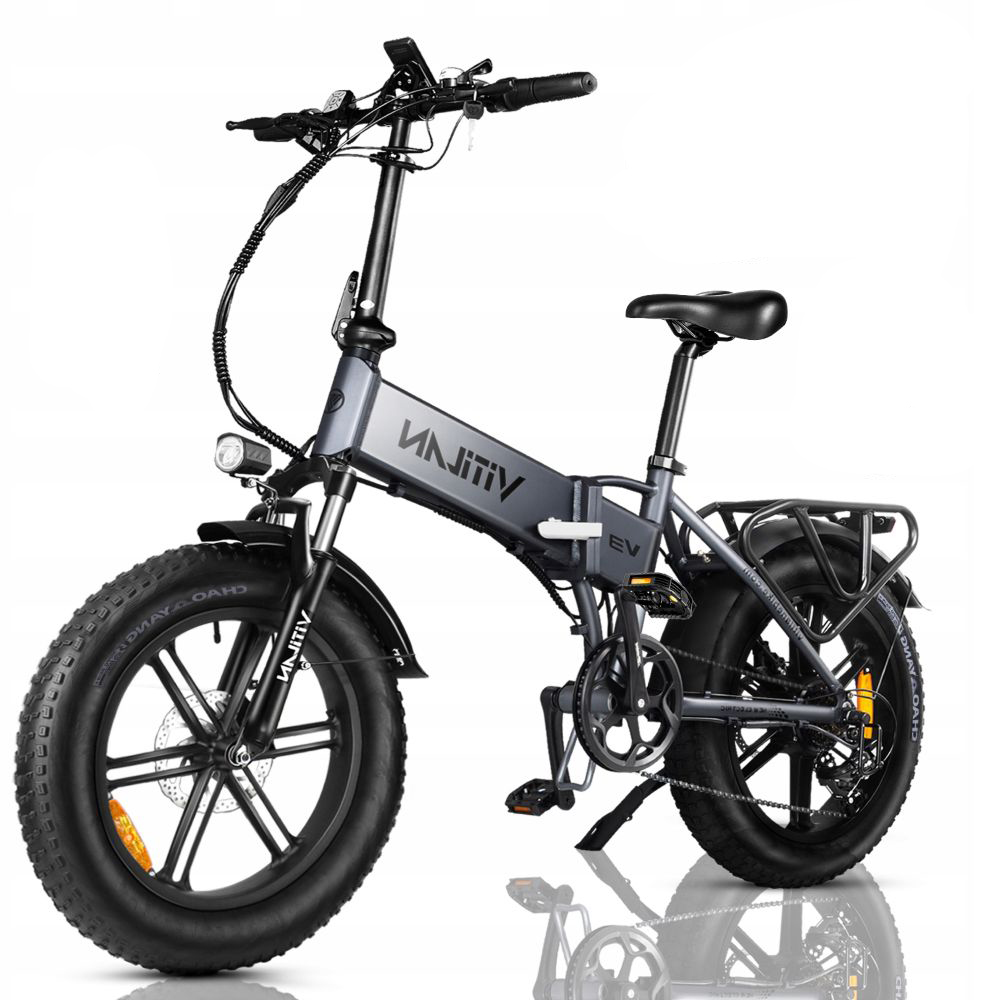 Bicicletta elettrica pieghevole grigia con pneumatici larghi, portapacchi e faro.