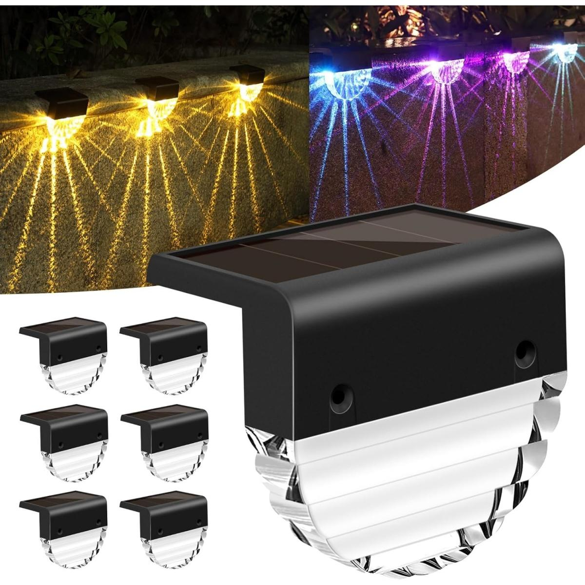 Solarbetriebene Lichter werfen gelbe und lila Lichtmuster auf eine strukturierte Wand.