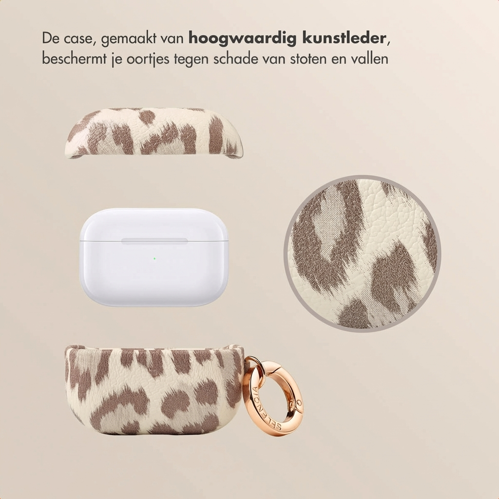 White AirPods case with leopard print cover and gold carabiner.