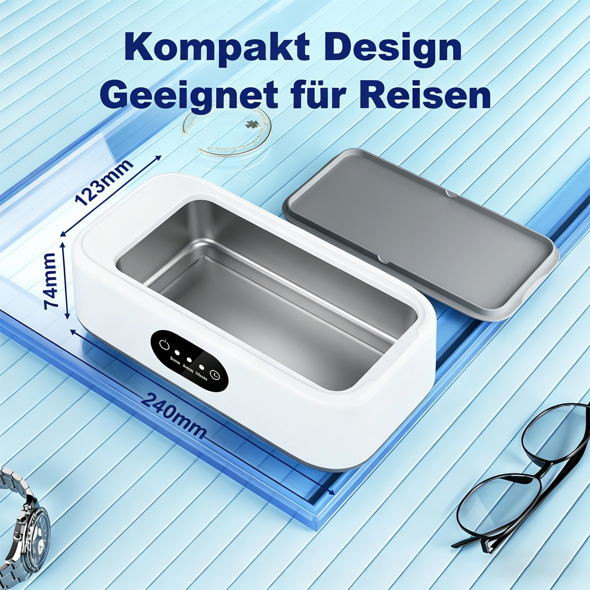 Weiße Ultraschallreiniger-Box mit Deckel, neben Brille und Uhr.