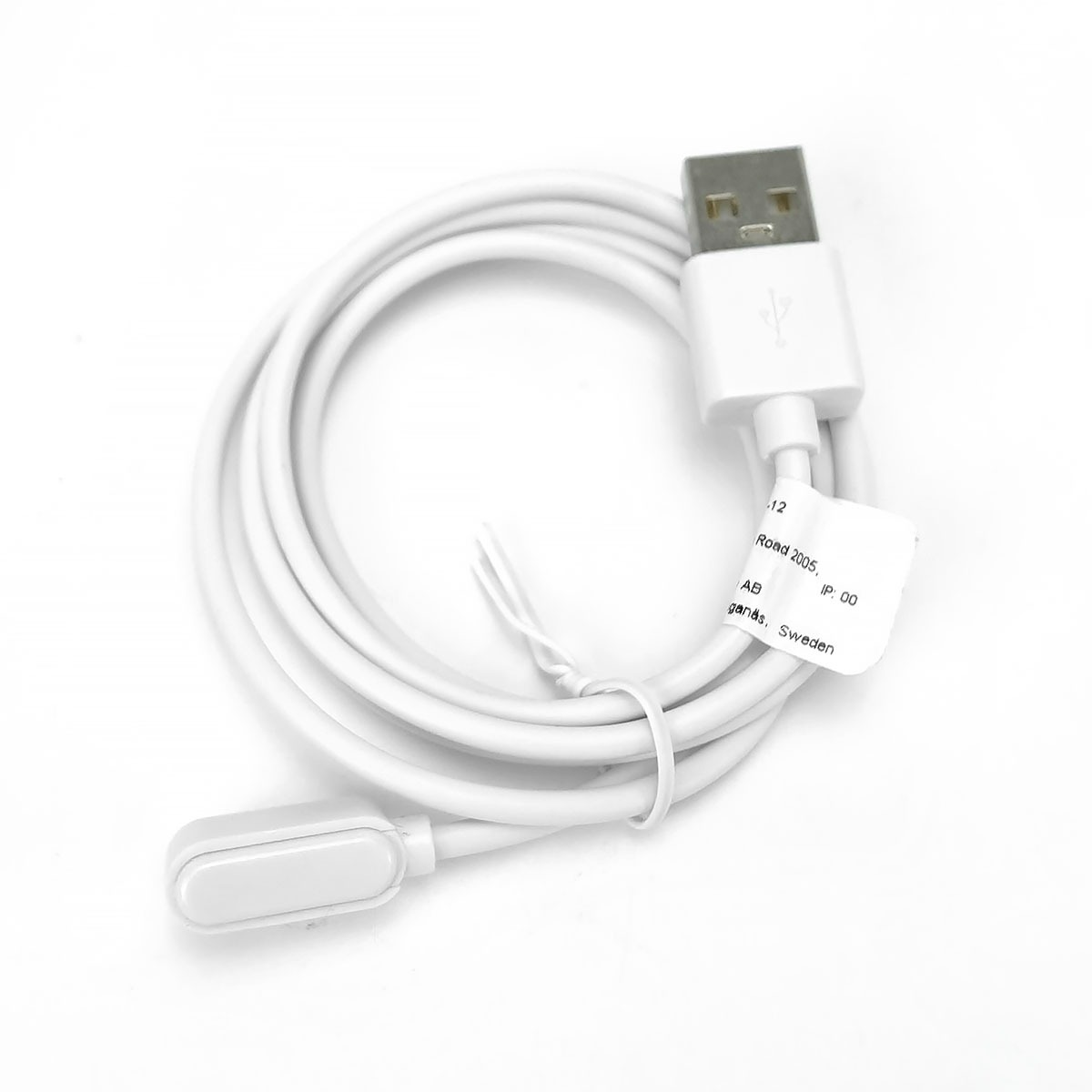 Biały kabel USB z magnetycznym złączem, zwinięty.