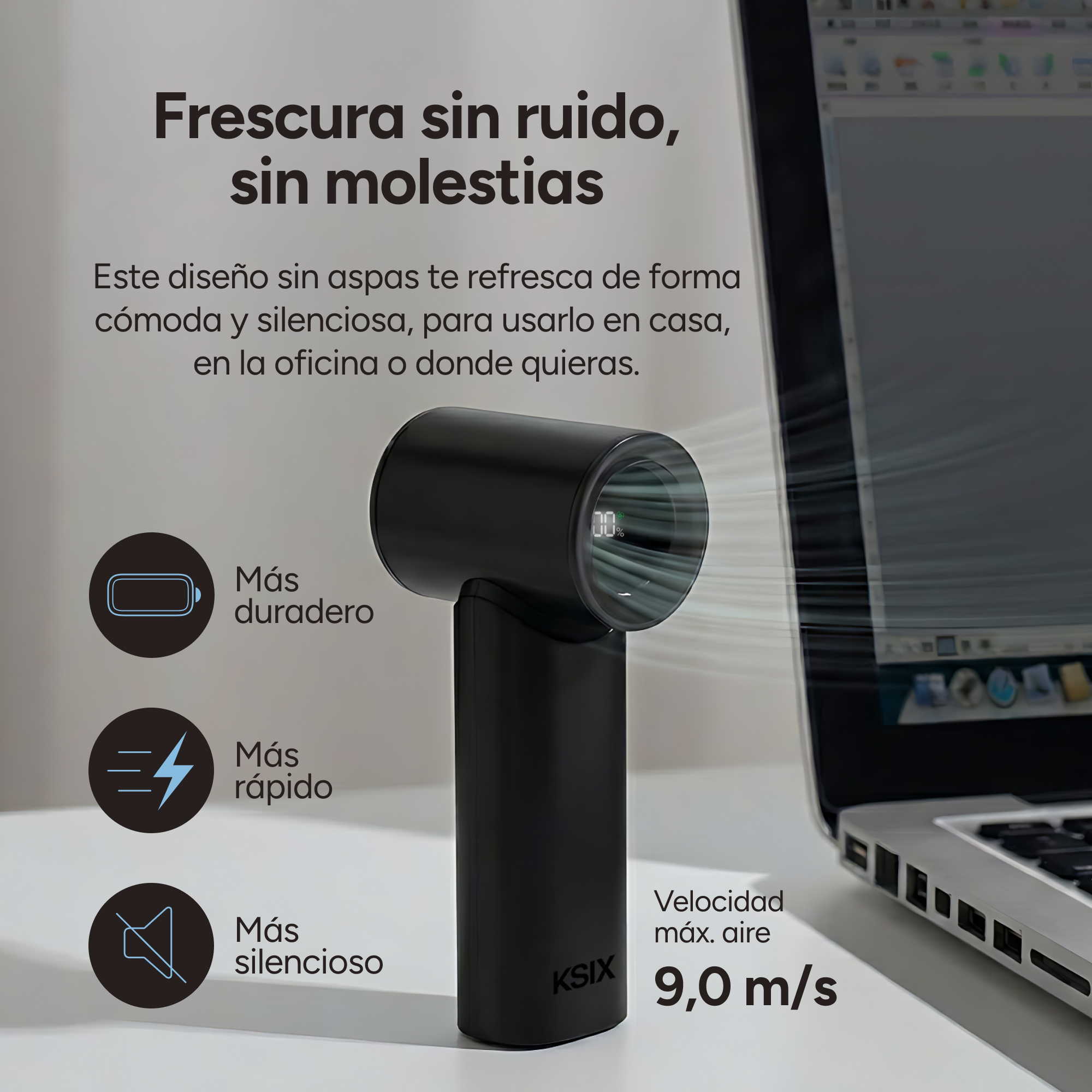 Un ventilador negro sin aspas junto a un portátil en un escritorio, muestra 9,0 m/s.