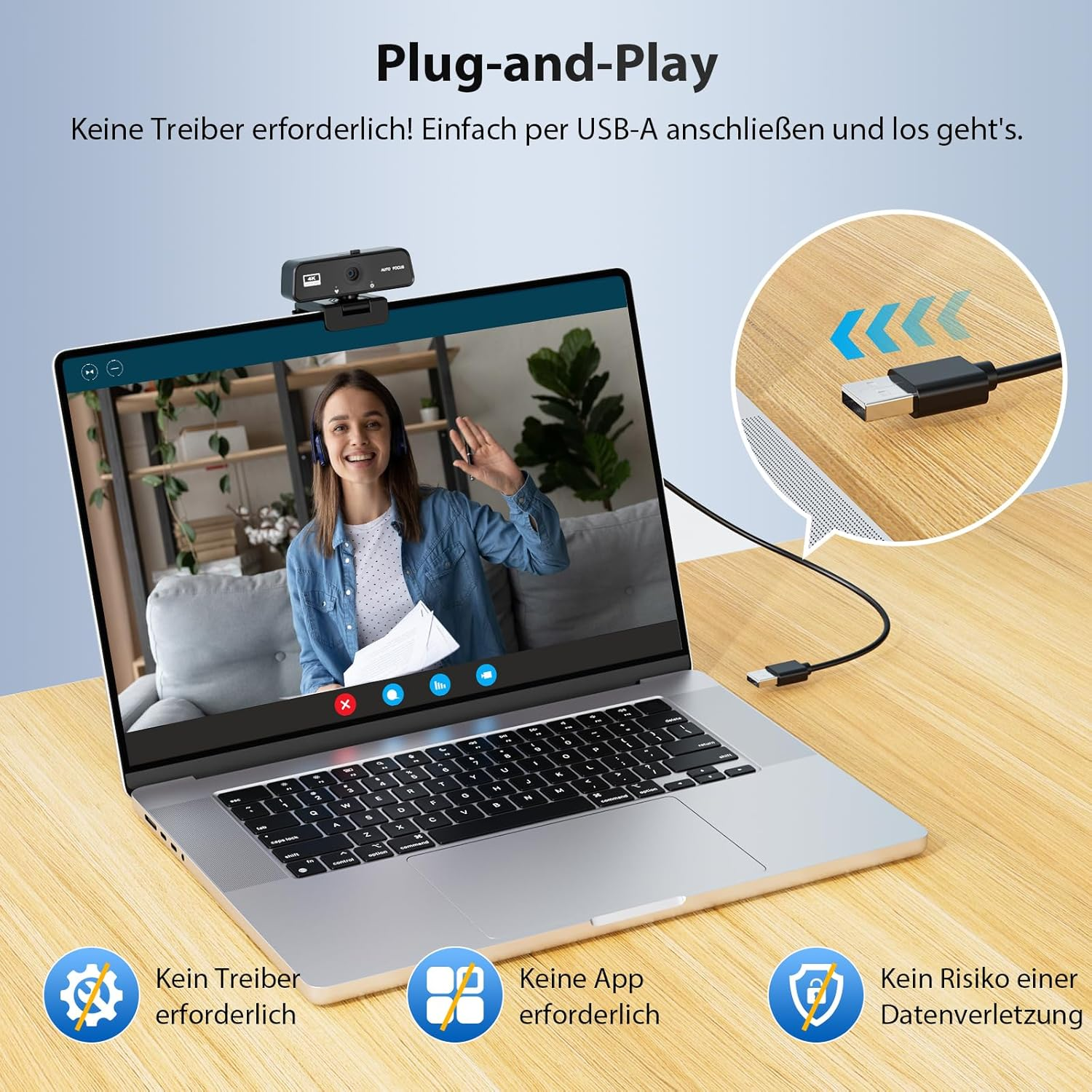 Laptop mit Webcam und USB-Kabel, Frau winkt. Plug-and-Play.