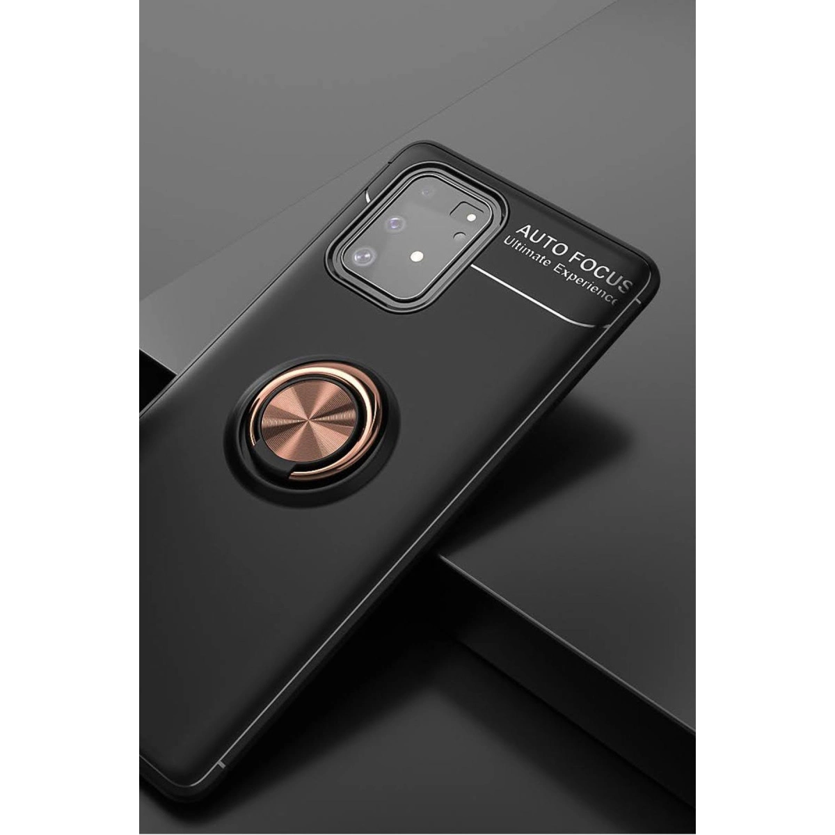 Gül altın halka tutuculu siyah telefon kılıfı ve odak metni.