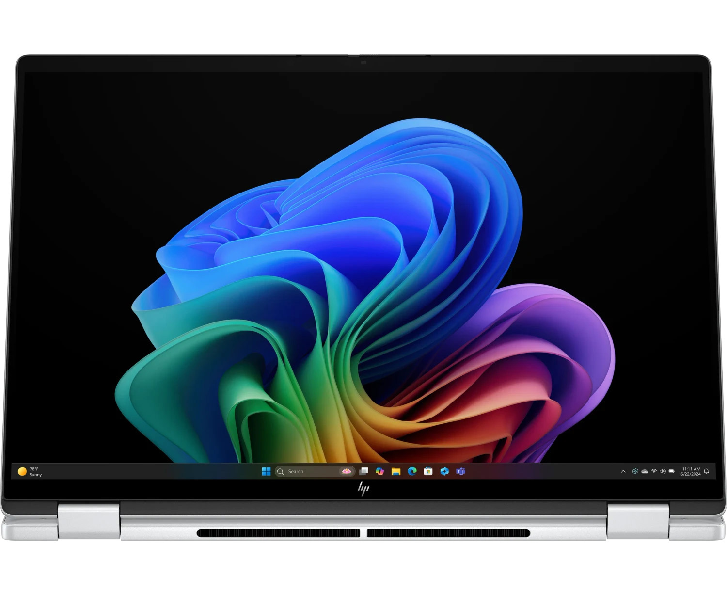 Ein offener Laptop mit einem bunten, abstrakten Hintergrundbild auf dem Bildschirm.