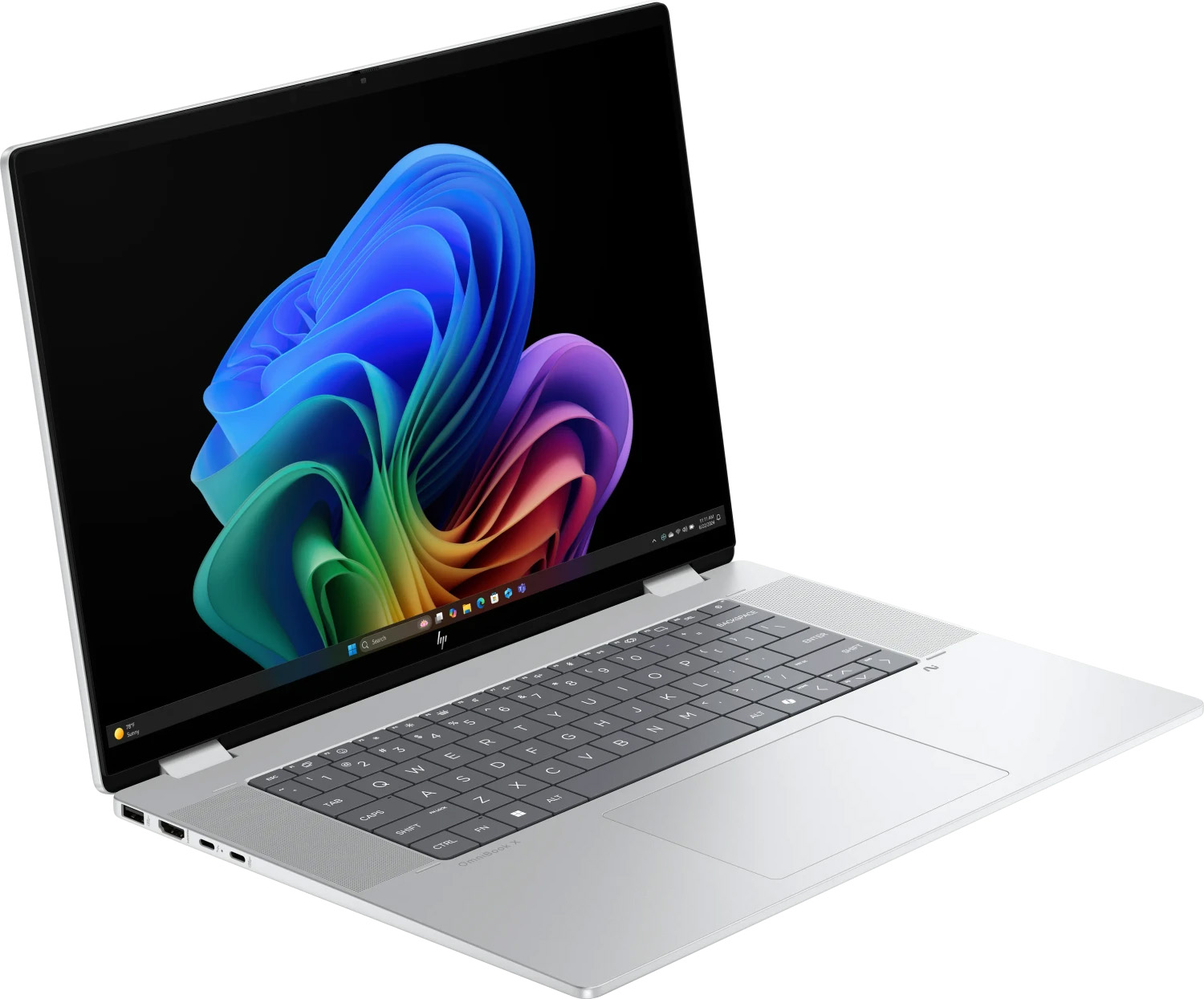 Ein geöffneter silberner Laptop mit einem bunten Hintergrundbild auf dem Bildschirm.