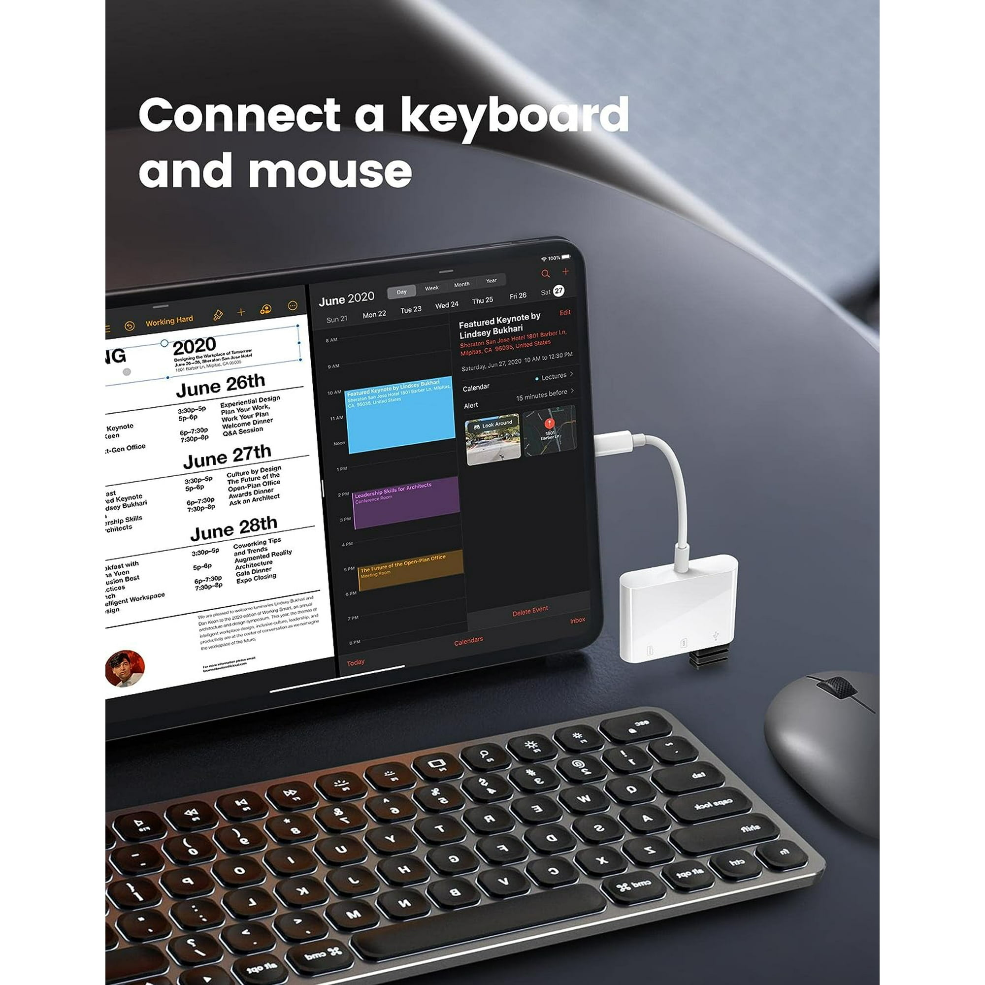 Ein Smartphone zeigt einen Kalender, daneben liegen eine Tastatur und eine Maus.