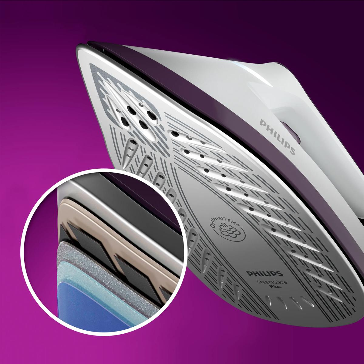 Primer plano de la suela de una plancha de vapor Philips con construcción en capas en círculo.