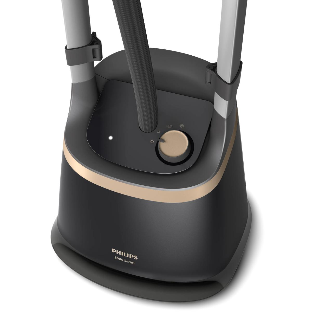 A black Philips 3000 Series garment steamer with gold accents and a silver pole.