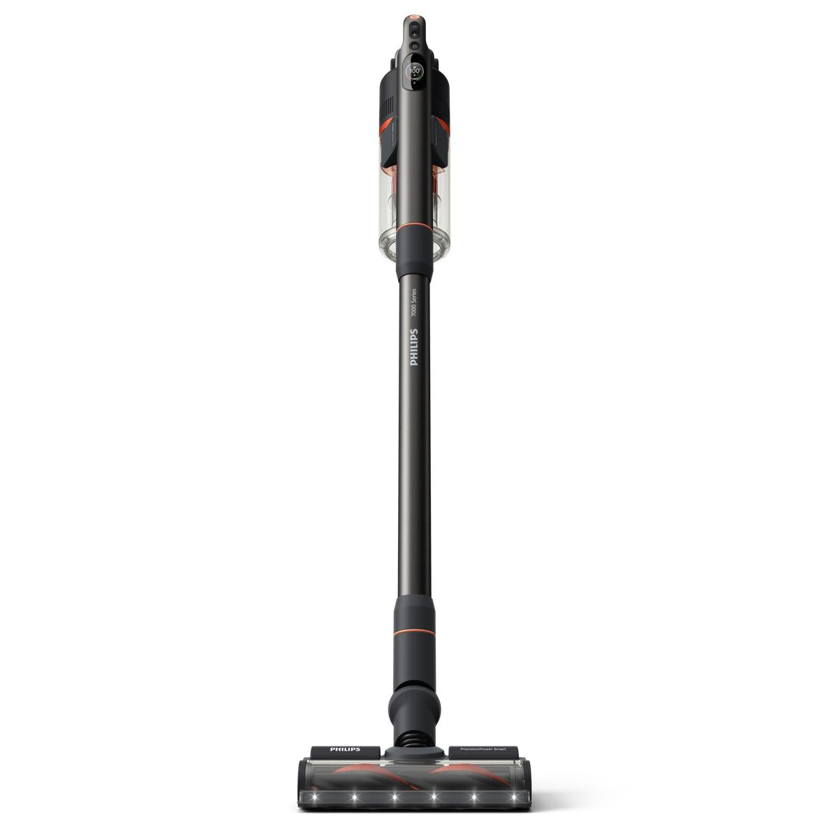 Un aspirateur balai Philips gris et orange avec lumières LED sur la brosse au sol.