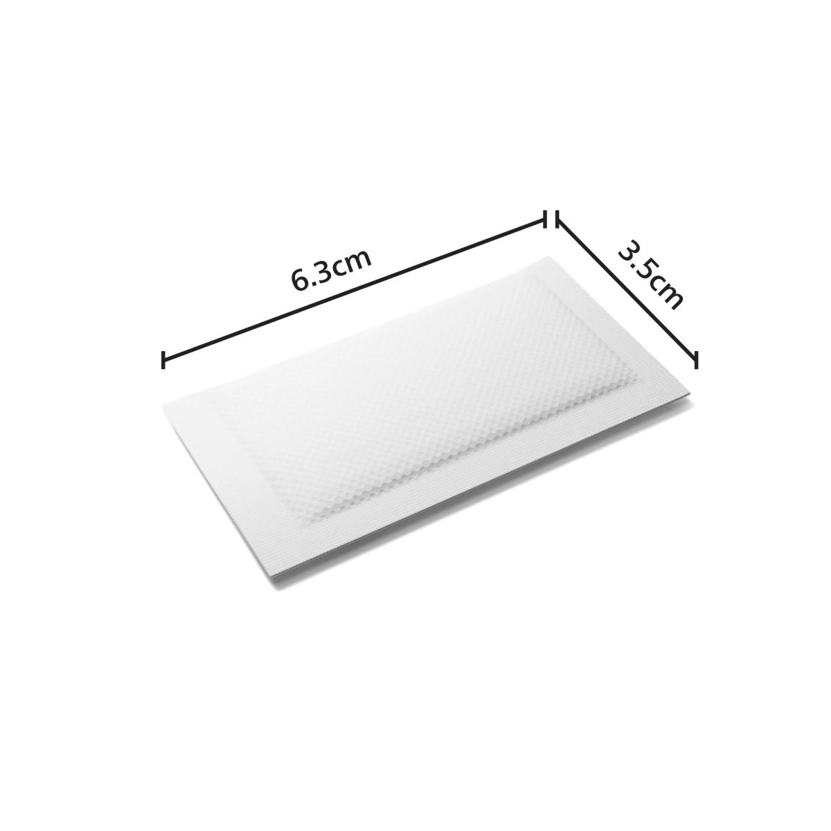 Ein weißes, rechteckiges Objekt mit einer Wabenstruktur und Maßangaben von 6,3cm und 3,5cm.