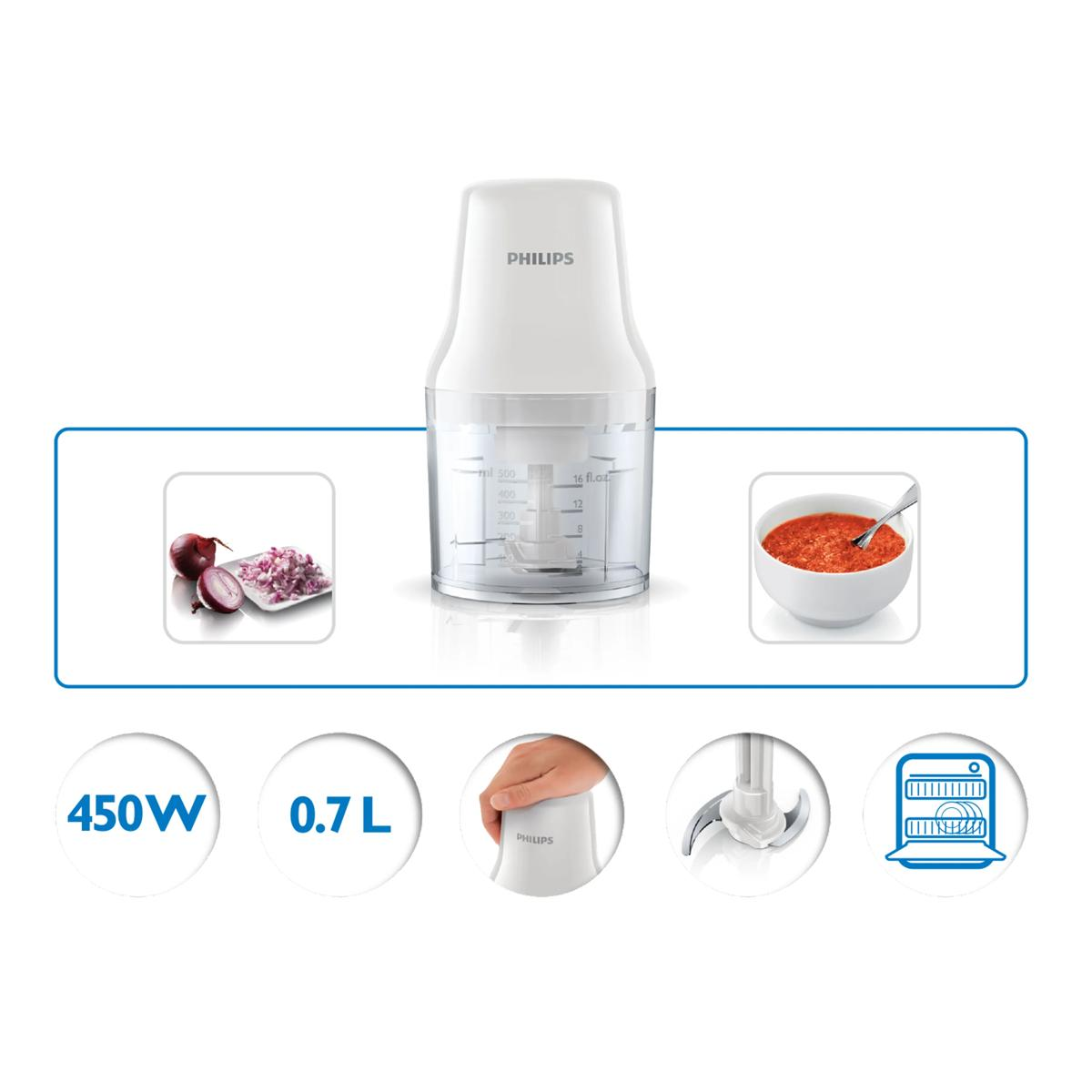 Un picador Philips blanco con vaso medidor, cebollas y salsa.