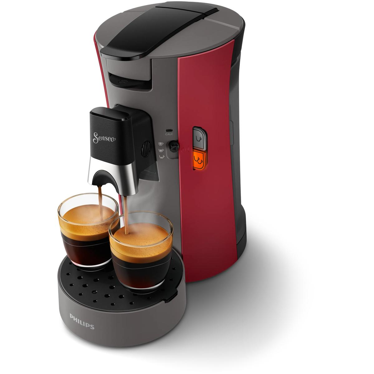 Eine rot-graue Senseo-Kaffeemaschine brüht Kaffee in zwei Gläser.