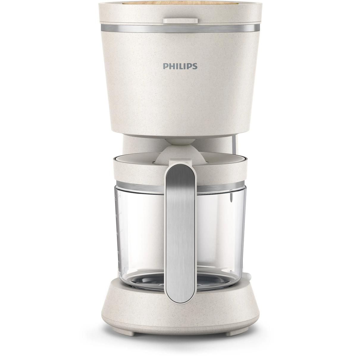 Şeffaf sürahili ve ahşap kapaklı beyaz Philips kahve makinesi.