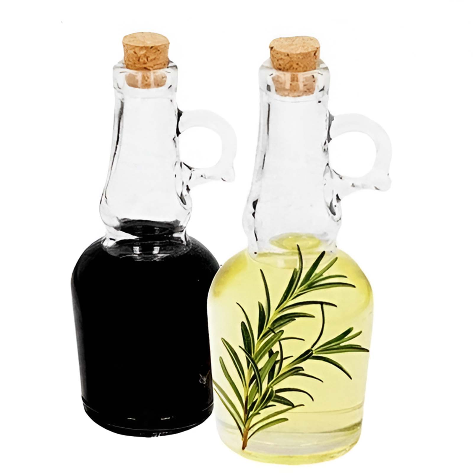 Due piccole bottiglie di vetro con tappo di sughero, una con liquido scuro, una con olio e rosmarino.