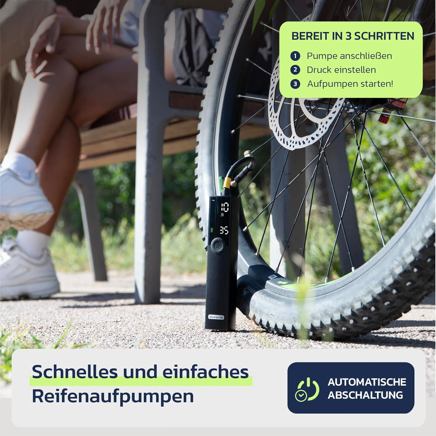 Schwarzer Fahrradreifen mit Luftpumpe und digitaler Anzeige. "Bereit in 3 Schritten".