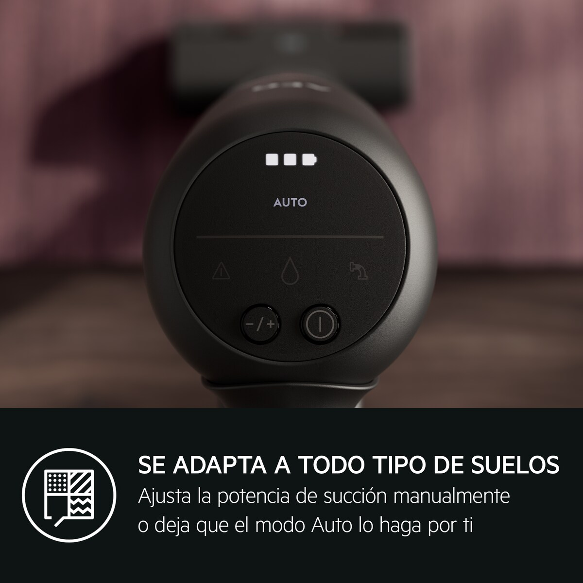 Aspirapolvere nero portatile con display digitale e pulsanti. Info sull'adattamento al pavimento.