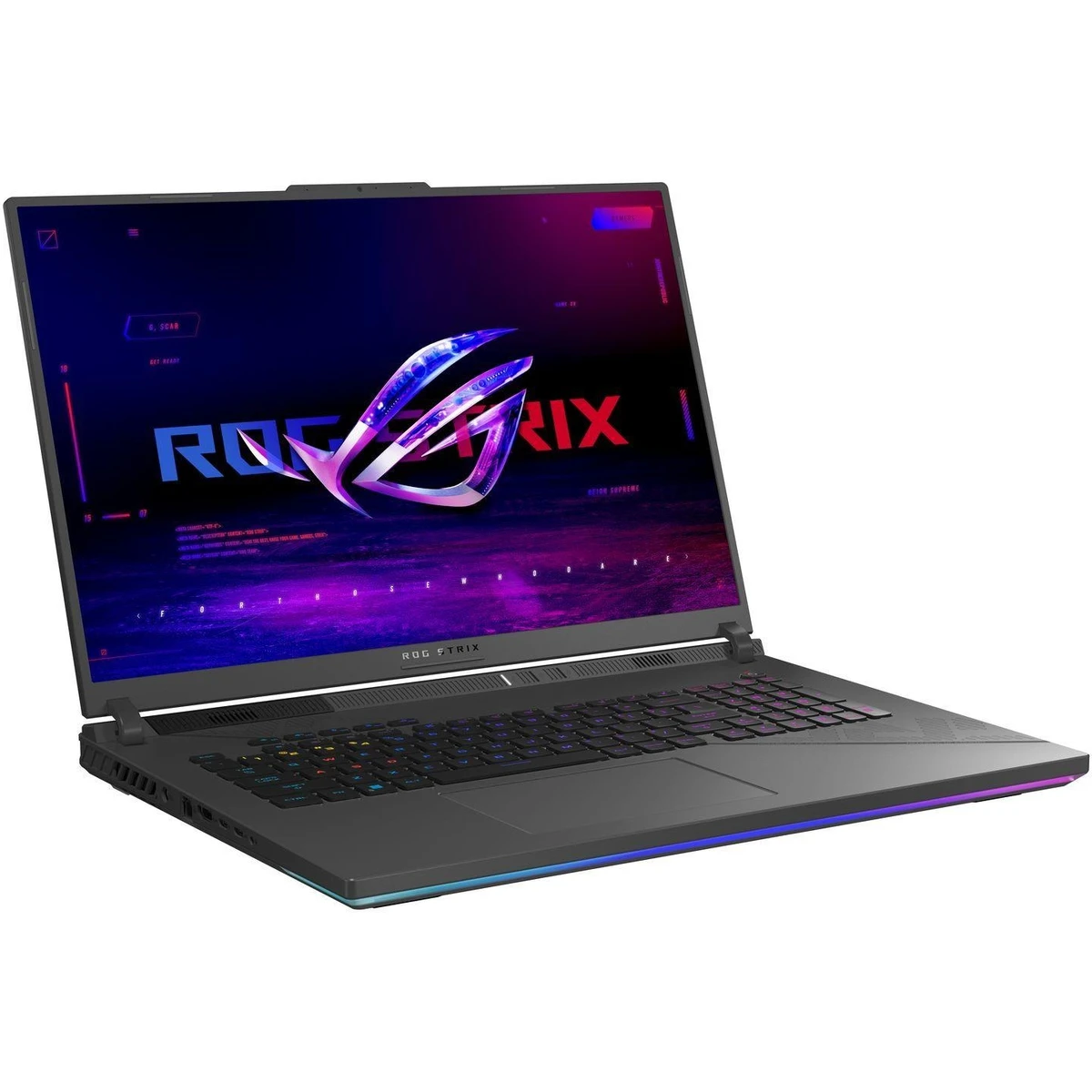 Ekranında logo ve RGB aydınlatmalı klavyeye sahip siyah ROG Strix dizüstü bilgisayar.