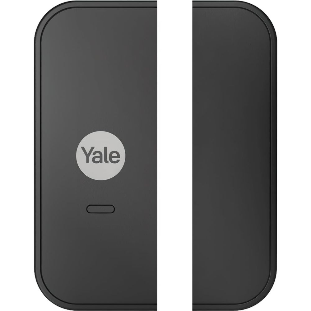 Una serratura Yale nera con una fessura ovale.