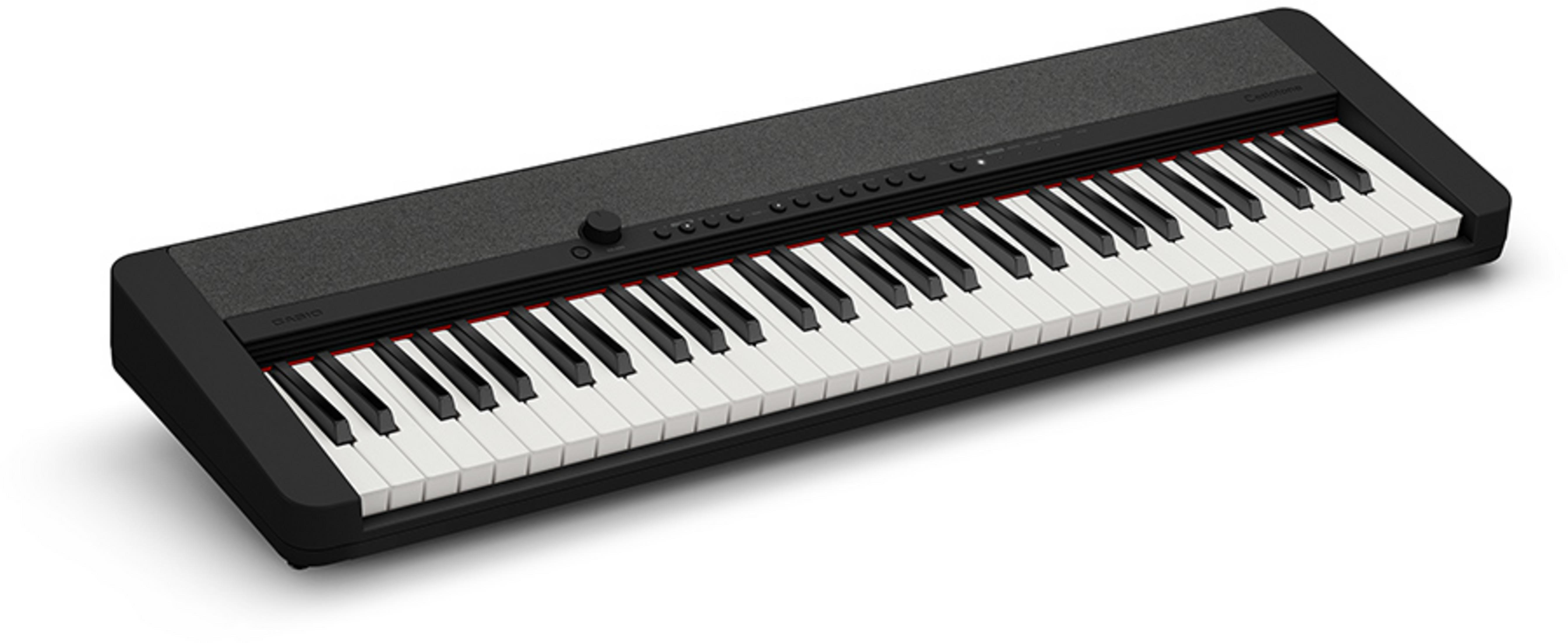 Un clavier noir avec des touches blanches et noires, dessus en tissu gris.