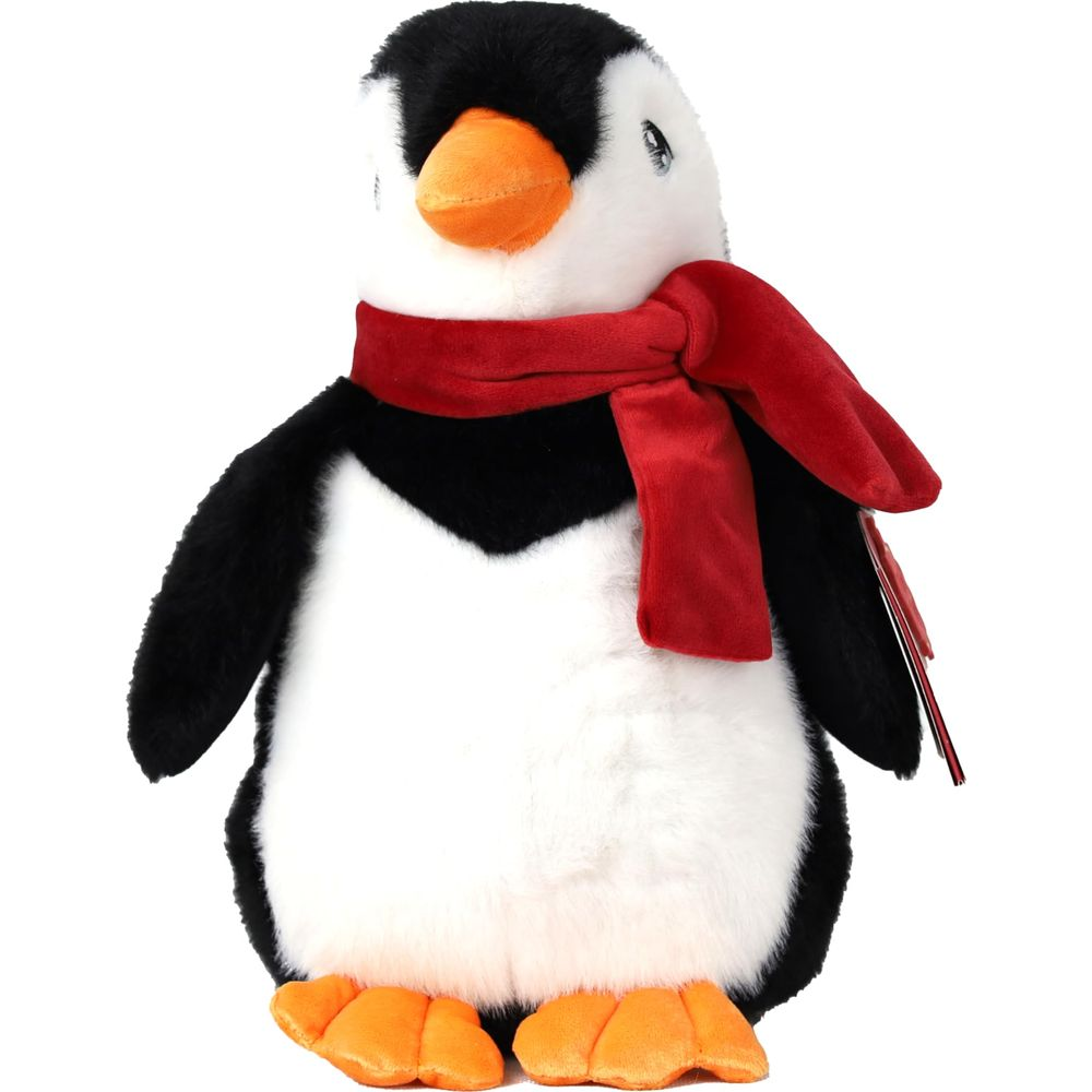Un pinguino di peluche con sciarpa rossa.