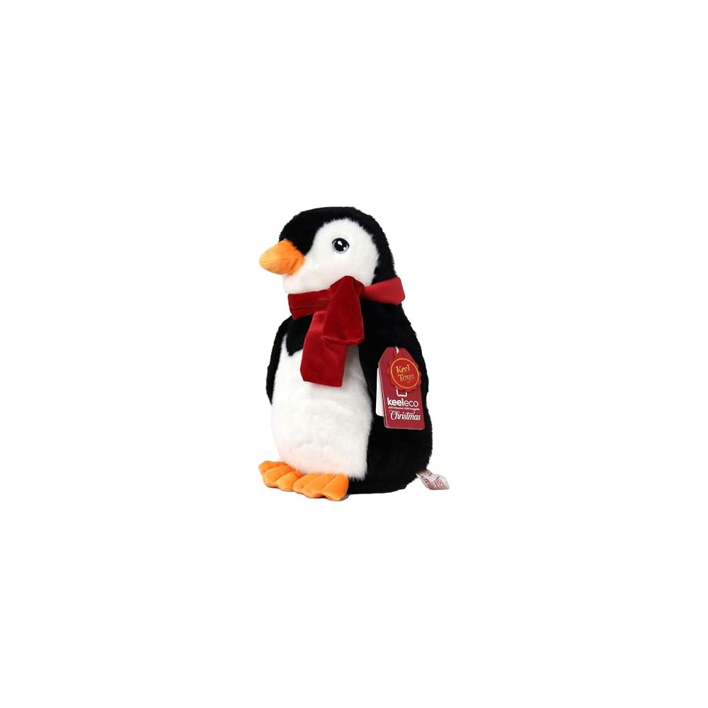 Un pinguino di peluche con sciarpa rossa e targhetta natalizia Keelco.