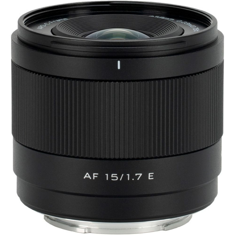 Obiettivo fotocamera nero con anelli zigrinati e testo AF 15/1.7 E.