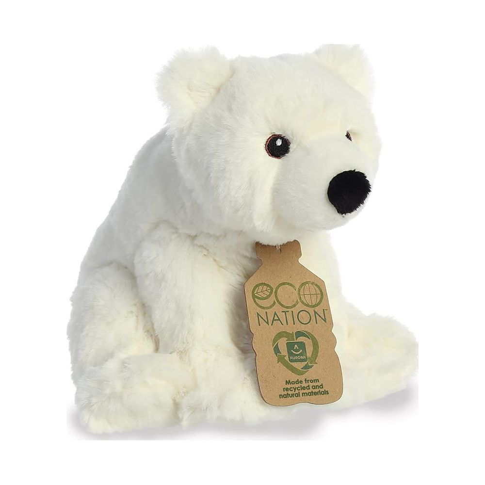Un orso polare di peluche bianco seduto, con un'etichetta ecologica marrone.