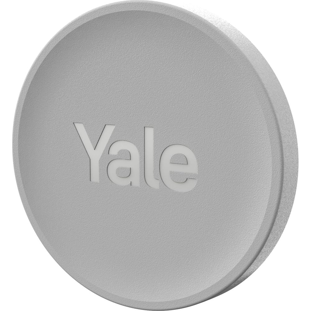 Un logo circolare Yale grigio su sfondo bianco.