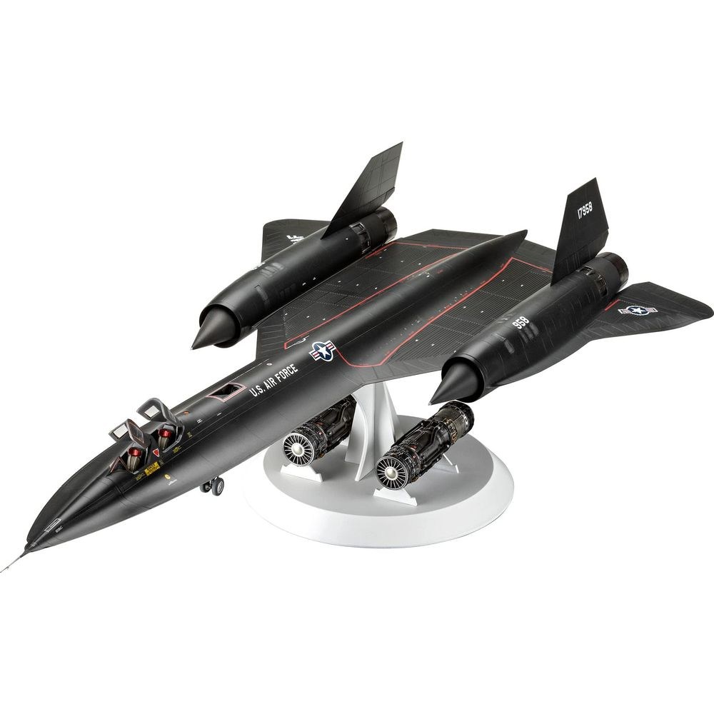 Un modèle détaillé noir d'un avion espion SR-71 de l'US Air Force sur un support blanc.