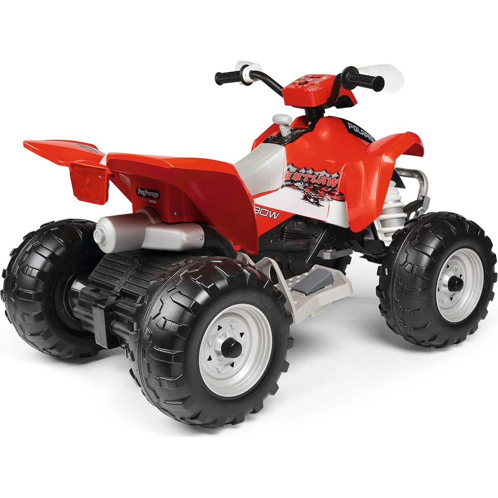 Un quad giocattolo rosso con quattro grandi pneumatici e cerchi bianchi.