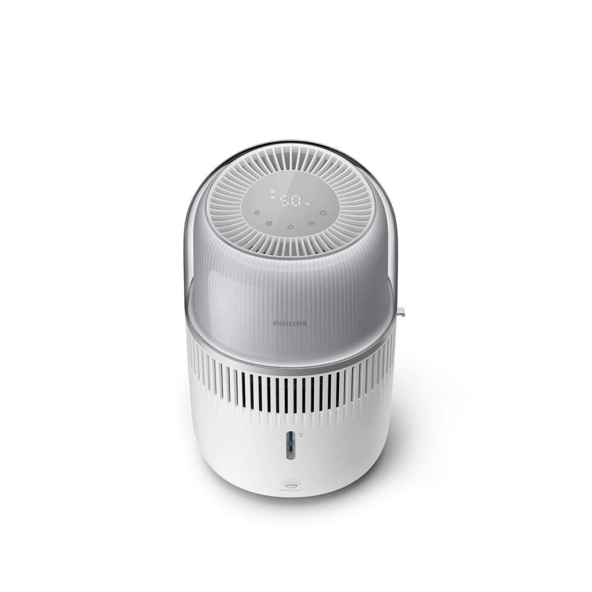 Ein weißer Philips Luftreiniger mit transparentem Oberteil und digitaler Anzeige.