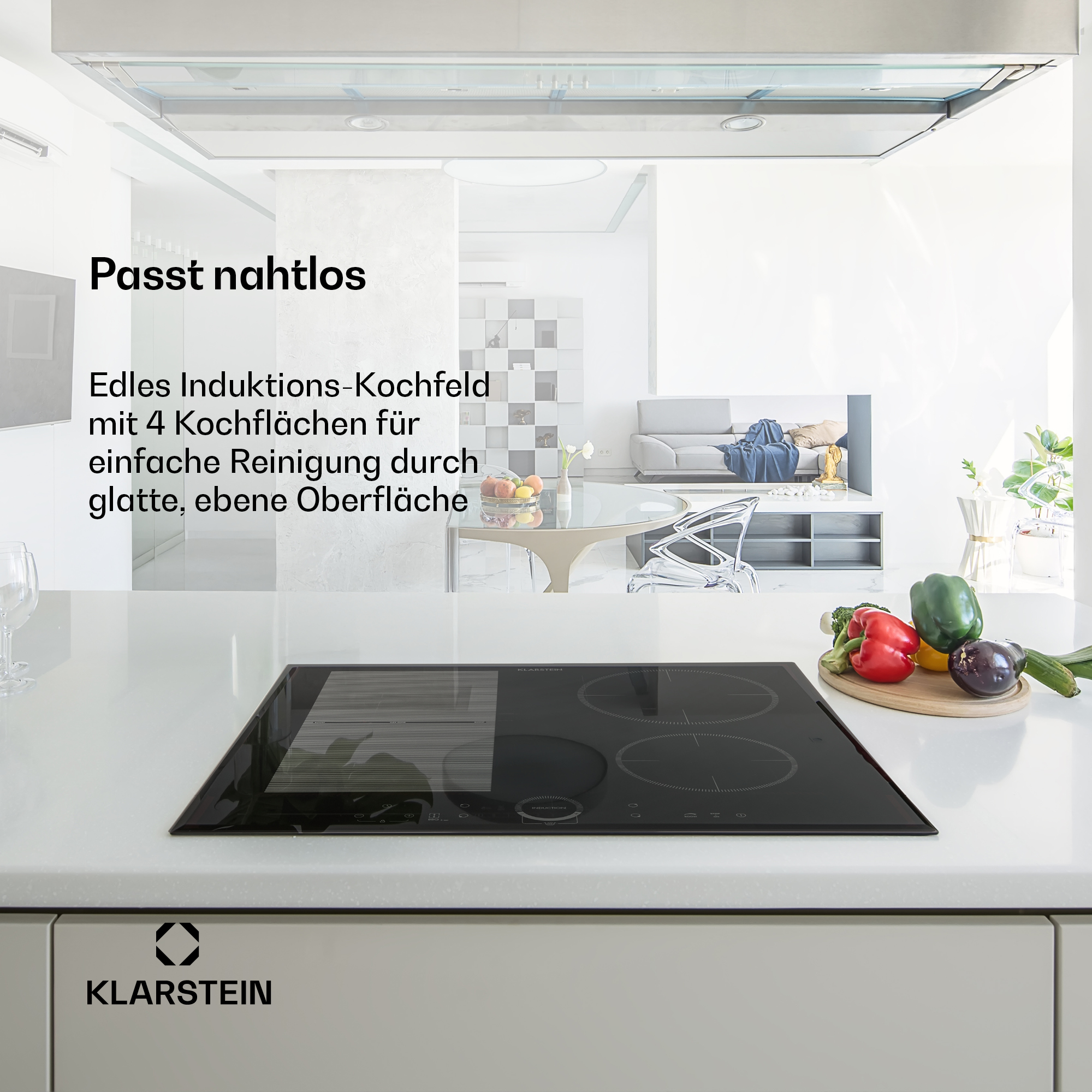 Glänzendes Induktionskochfeld mit 4 Kochzonen und Gemüse auf einer Arbeitsplatte.