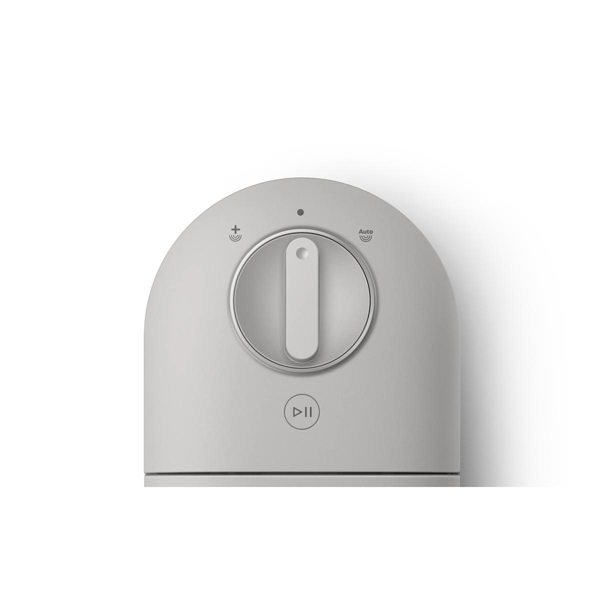 Grauer Knopf mit Plus- und Auto-Symbolen und Play/Pause-Tasten.