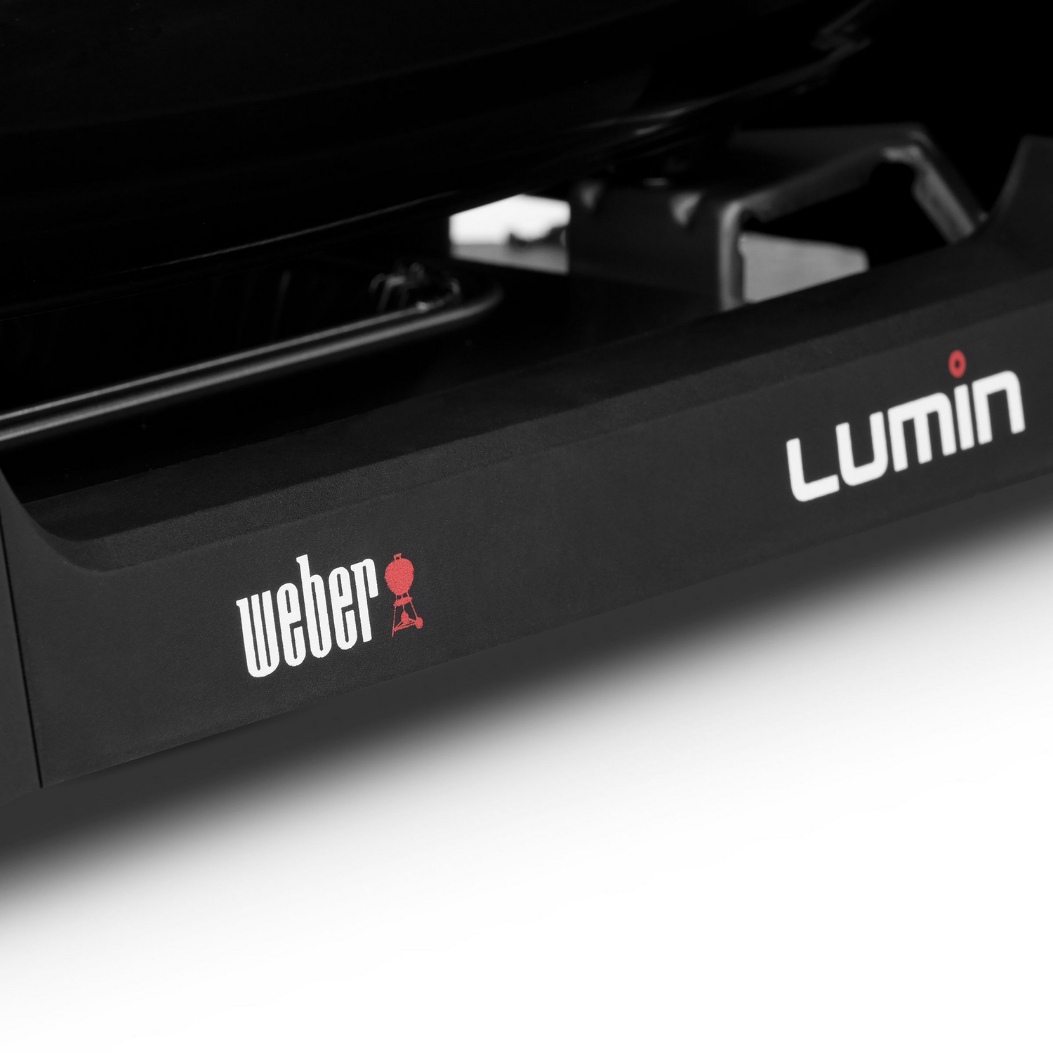 Griglia nera con loghi Weber e Lumin sul lato.