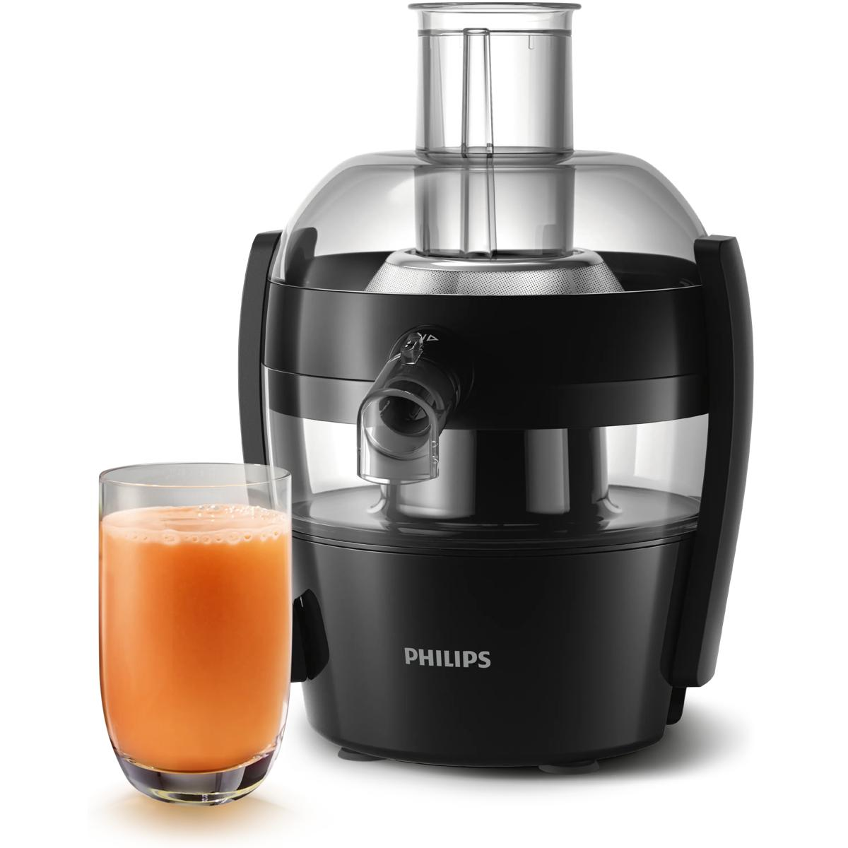 Ein schwarzer Philips Entsafter mit einem Glas Orangensaft daneben.