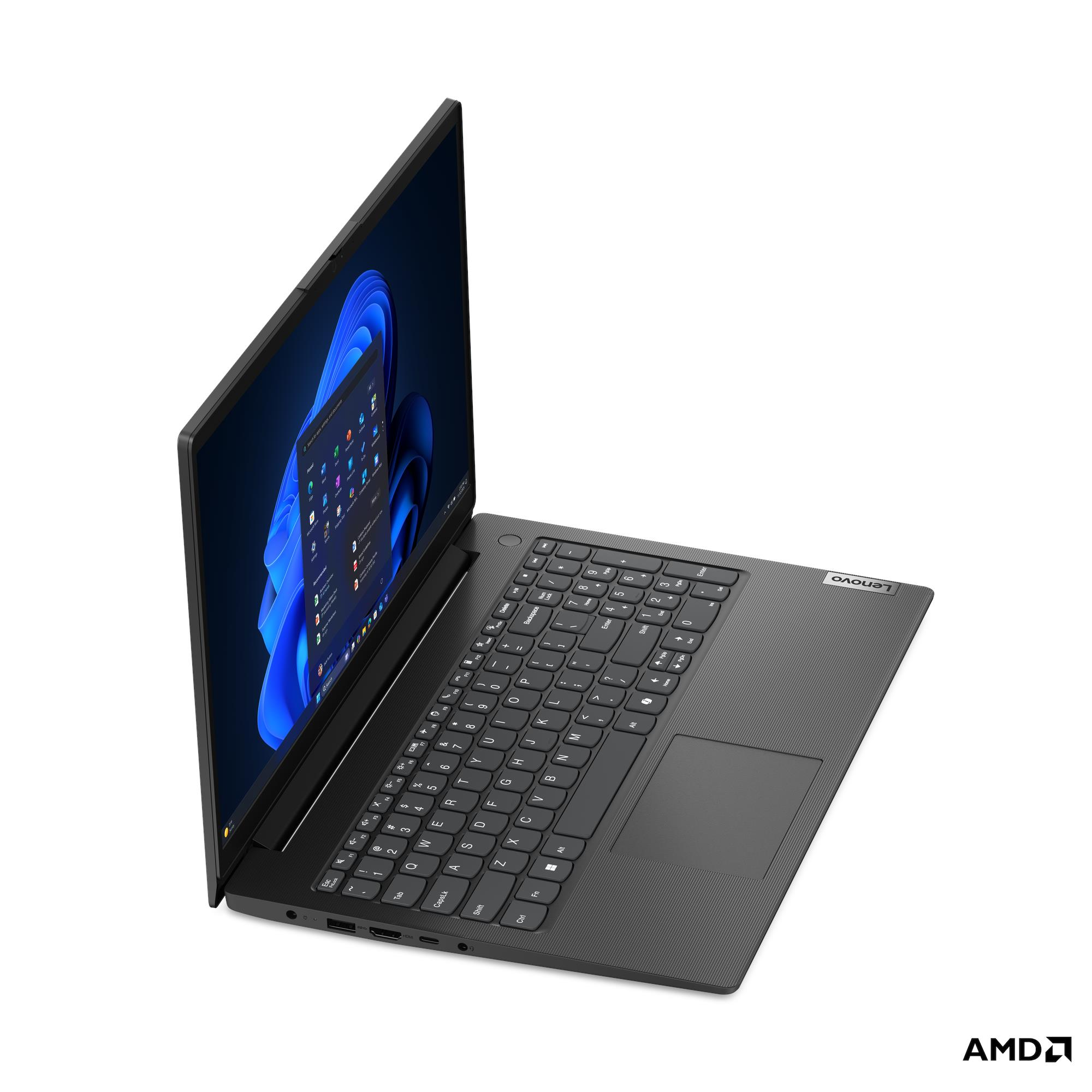 Un laptop Lenovo grigio chiuso che mostra Windows 11 sullo schermo.