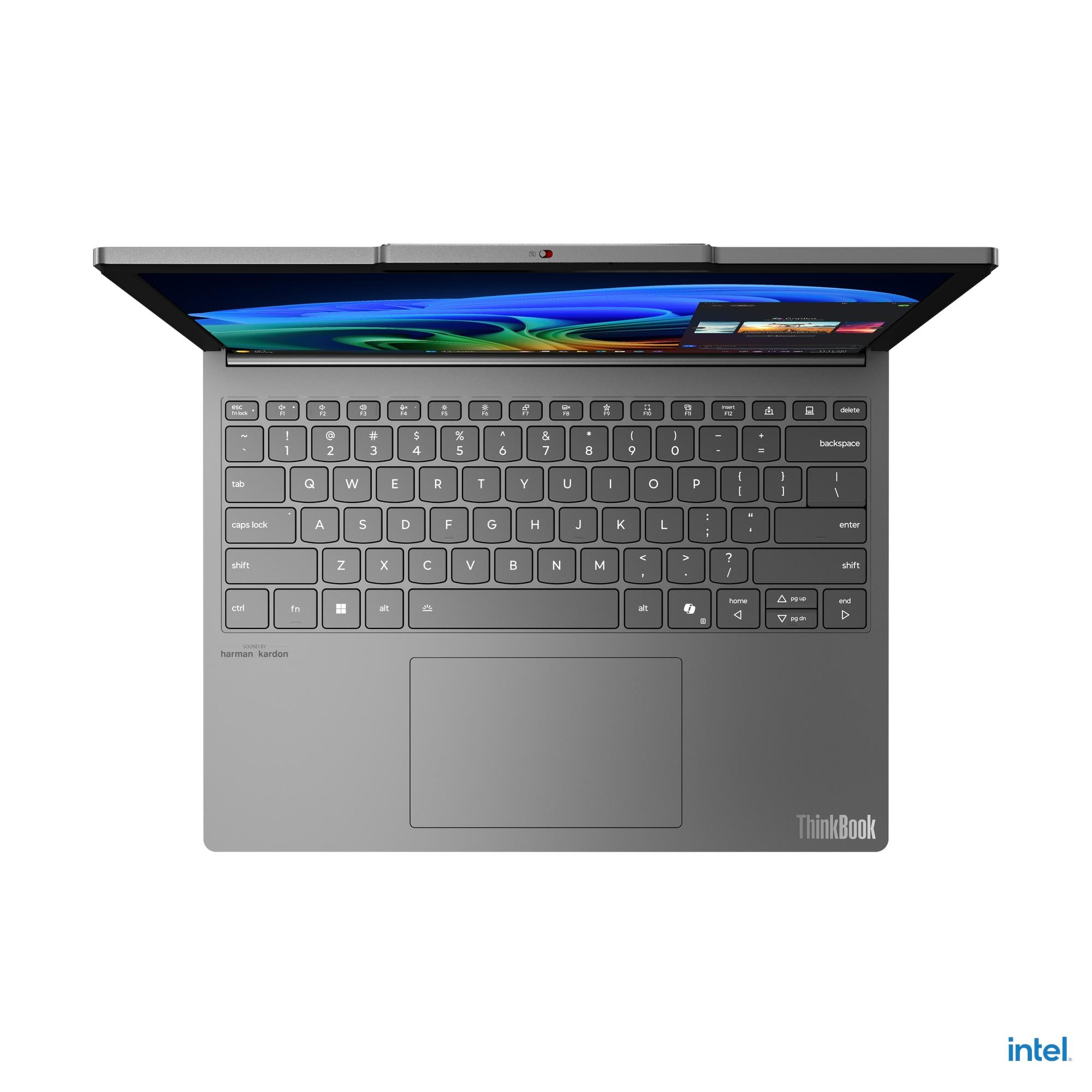 Laptop grigio con tastiera e touchpad, aperto e visto dall'alto.