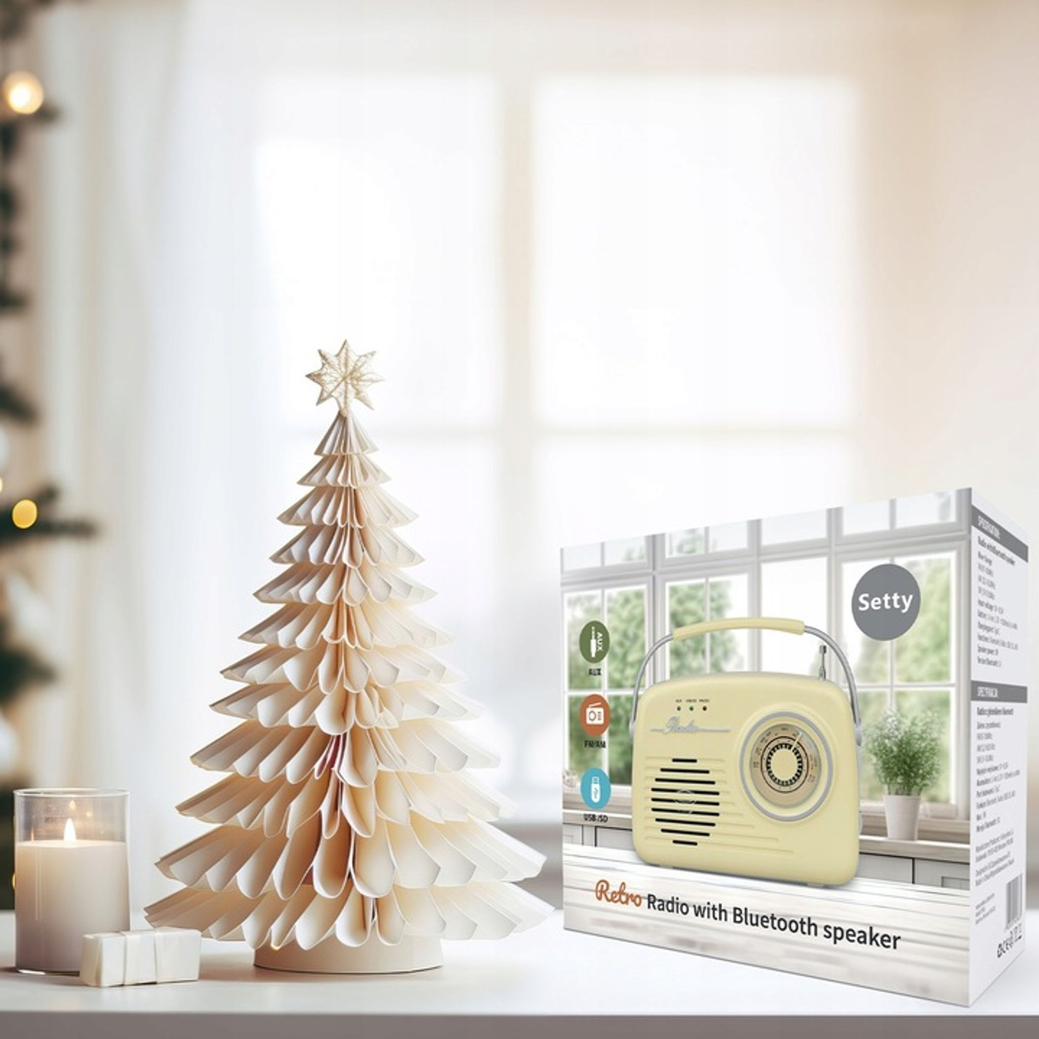 Kremowy głośnik radiowy retro stoi obok papierowej choinki.