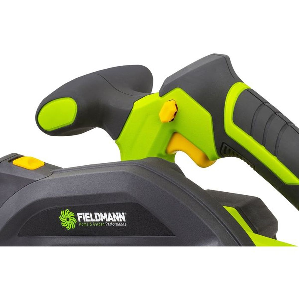 Zbliżenie czarnej i zielonej dmuchawy do liści z żółtymi przyciskami.