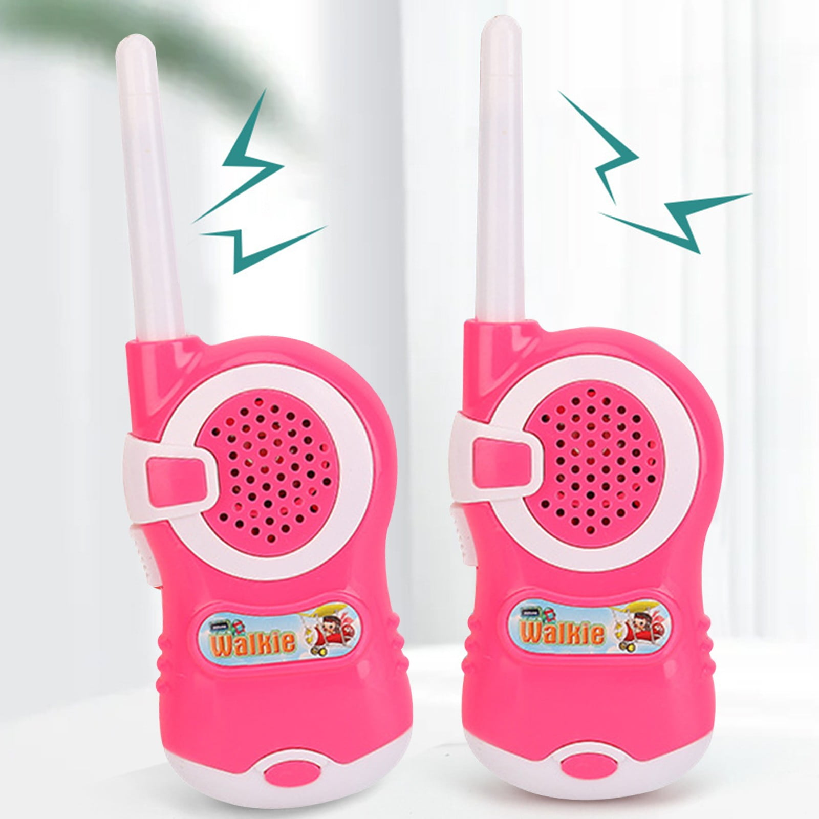Zwei pinke Spielzeug-Walkie-Talkies mit weißen Akzenten und Antennen.