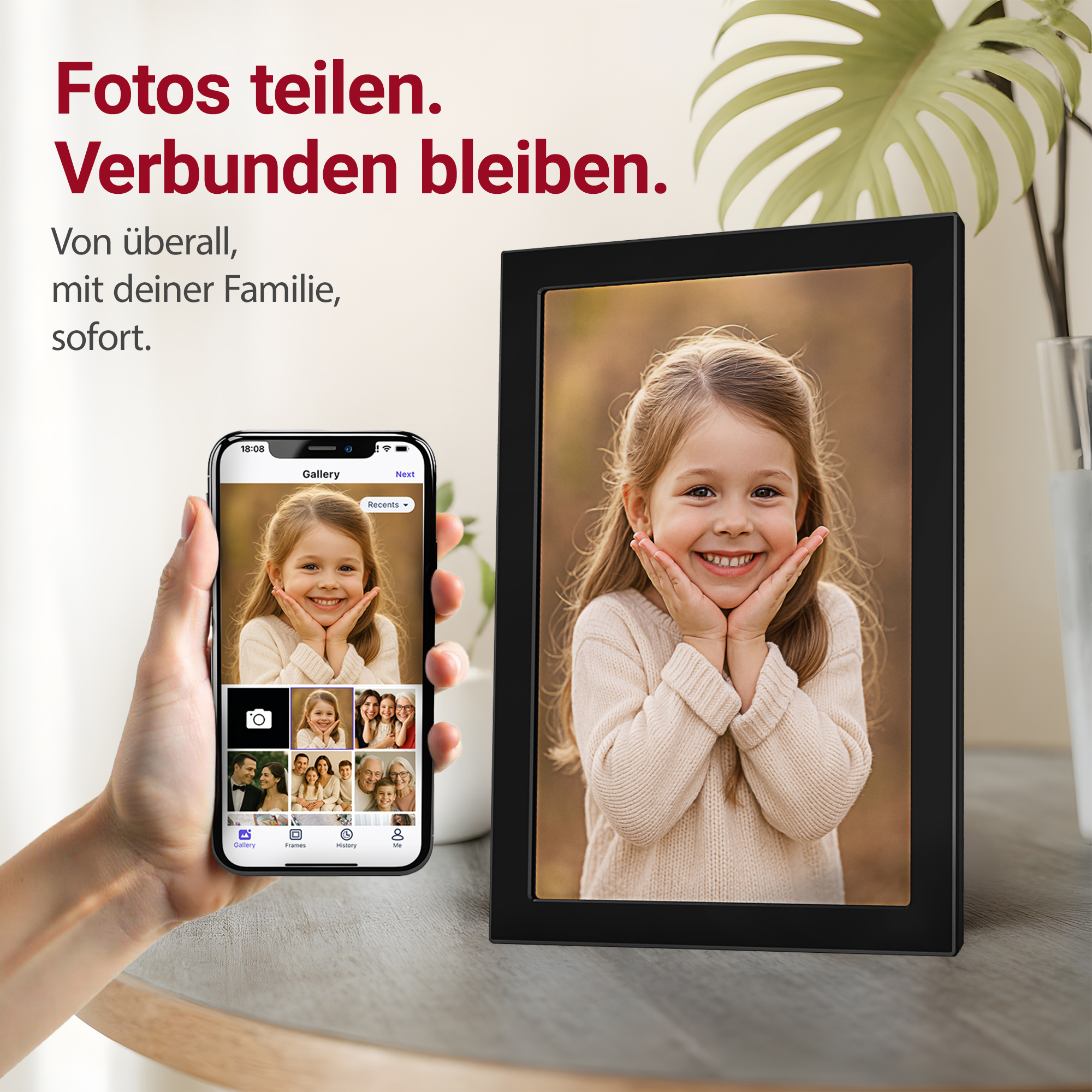 Ein Handy zeigt ein Foto eines lächelnden Mädchens, daneben ein Bilderrahmen mit demselben Foto.