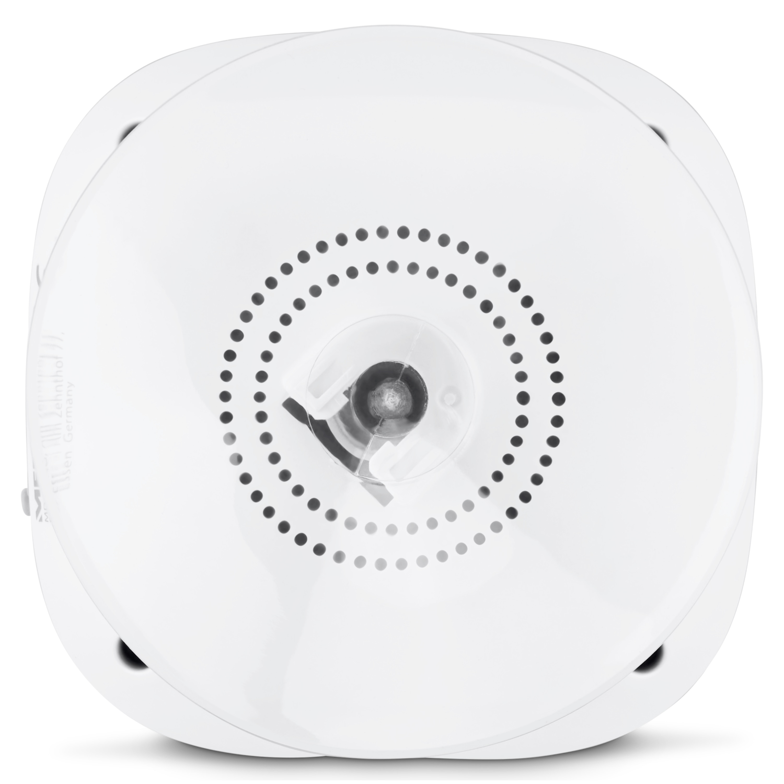 White round base with black dots and a central mechanism.