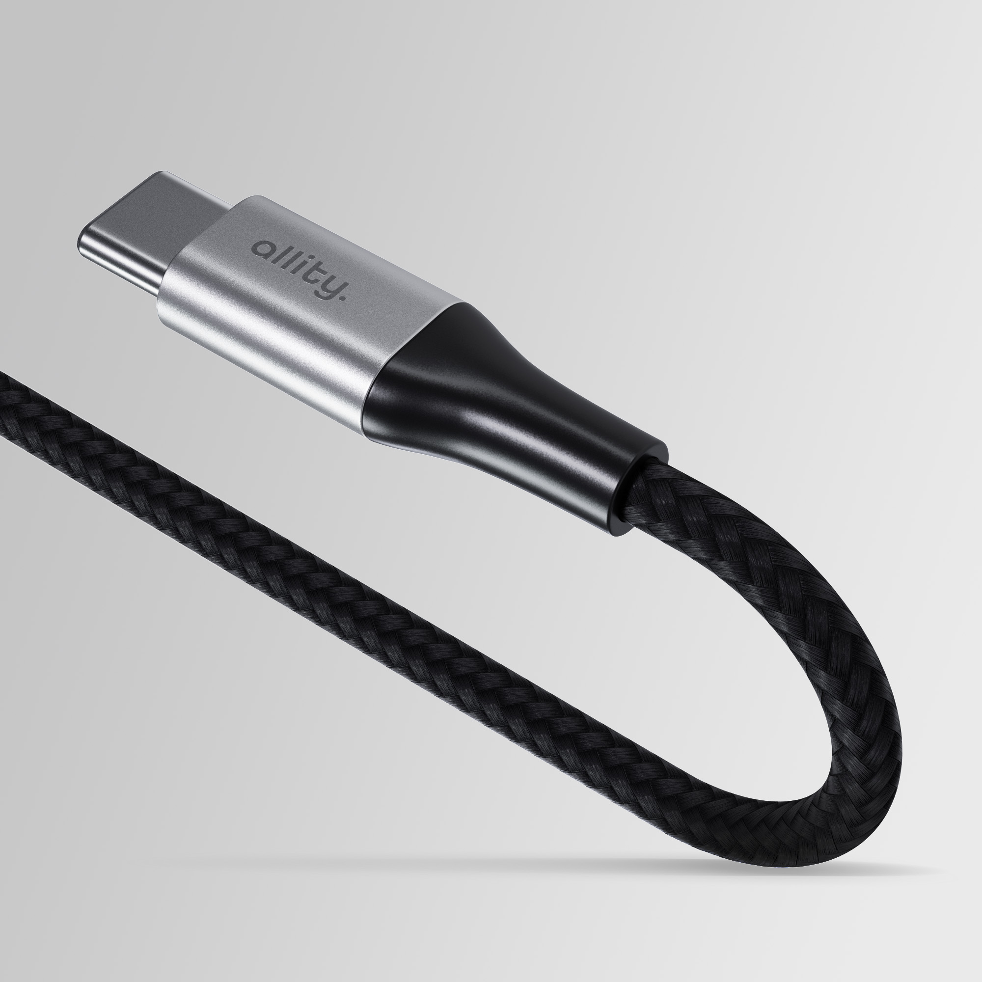 Un connettore USB-C argentato con cavo intrecciato nero e logo 'allity'.