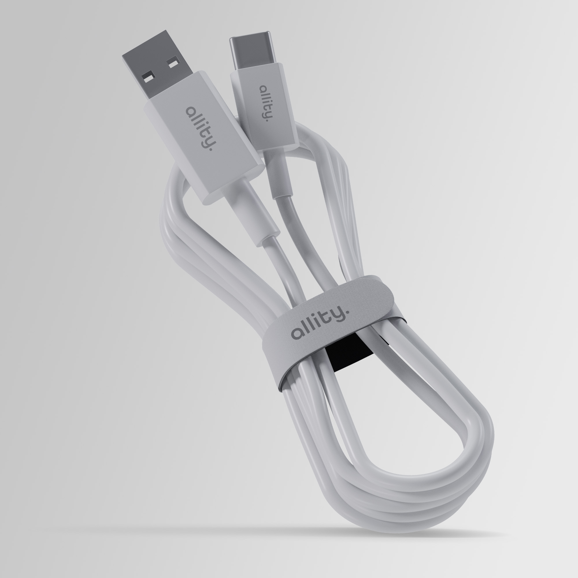 Biały kabel USB z wtyczkami USB-A i USB-C, związany rzepem.