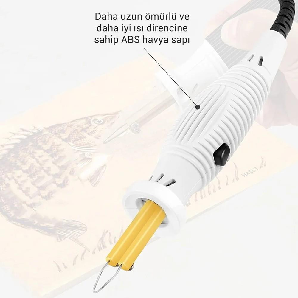 Balık çizimli ahşap pano üzerinde sarı uçlu beyaz pirografi kalemi.