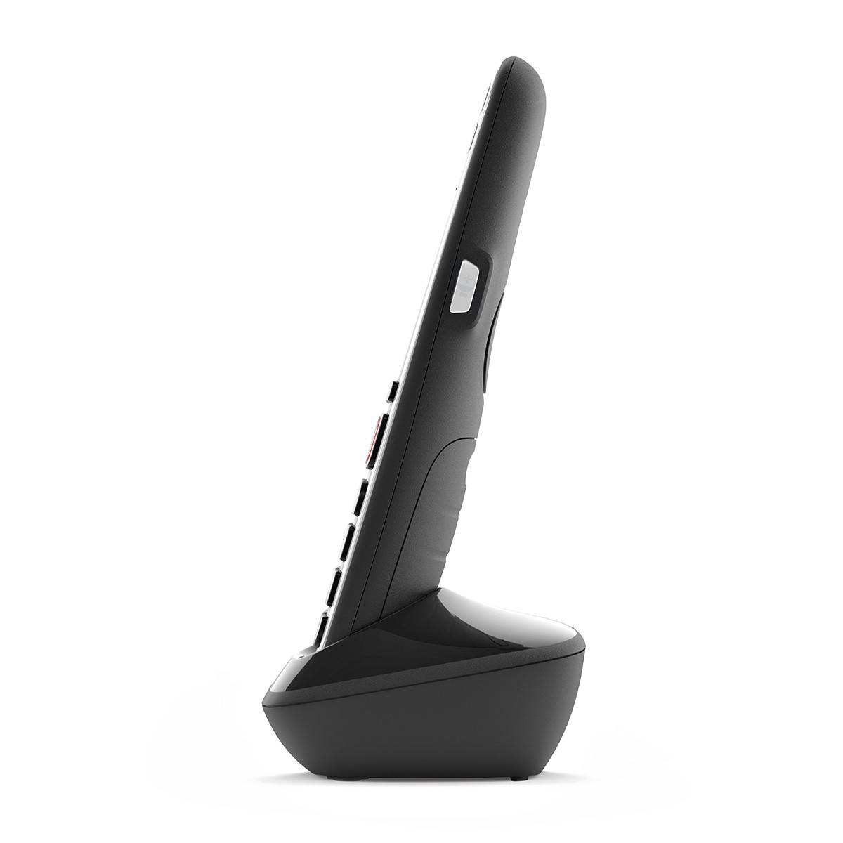 Ein schwarzes schnurloses Telefon ruht auf seiner Ladestation.